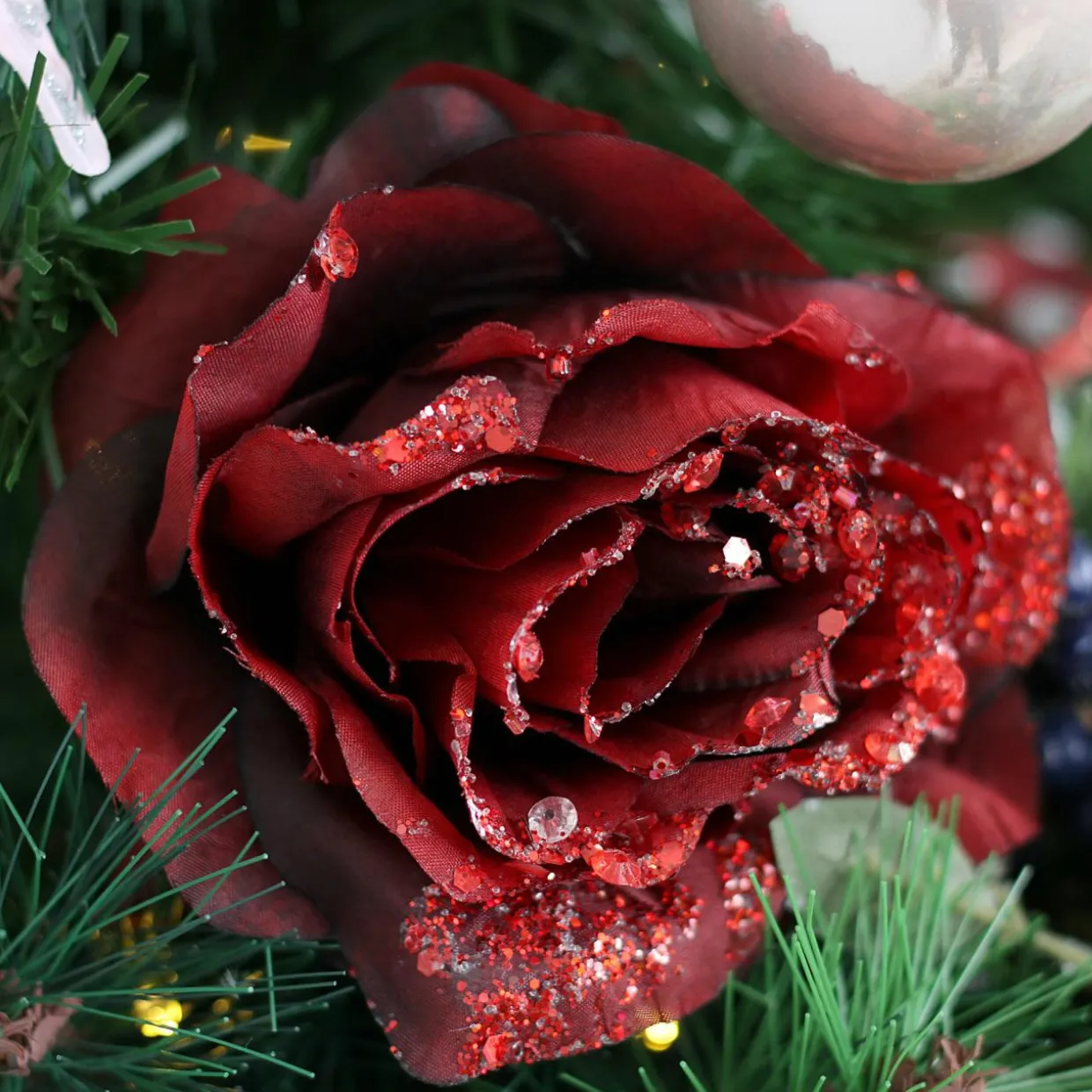 Fleur décorative sur pince (D8,5 cm) pailletée Bordeaux