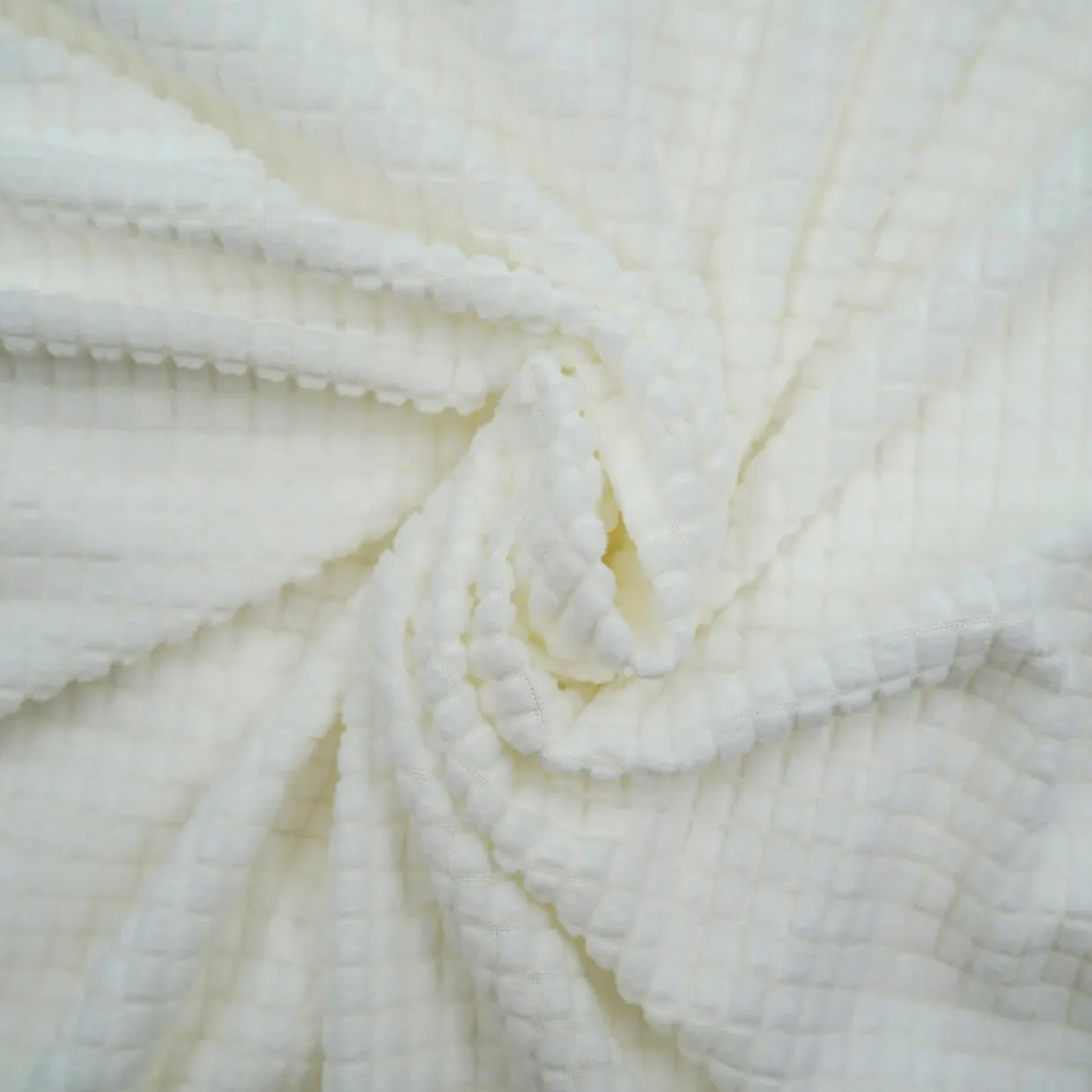 Housse de canapé extensible effet gaufré (225 x 245 cm) Sacha Blanc