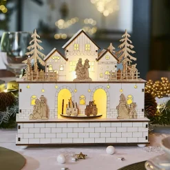 Village de Noël en bois lumineux et musical à piles (21 x H24 cm) Villageois en fête