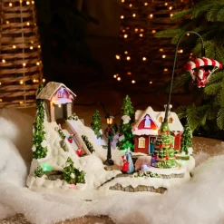 Village de Noël lumineux et animé (H31 cm) Aventures d'hiver