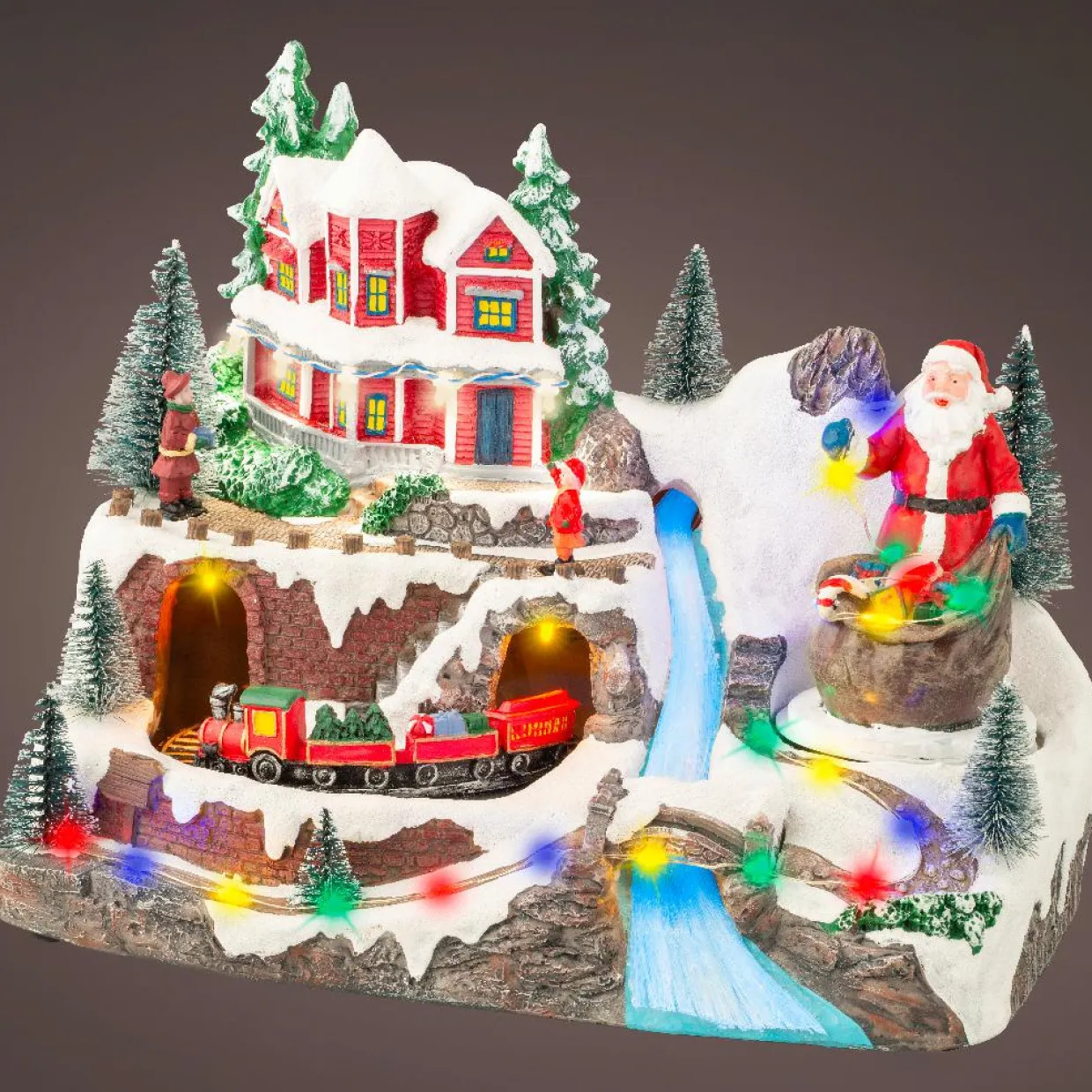 Village de Noël lumineux et musical Père Noël en montagne