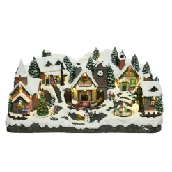 Village de Noël lumineux Montagne enneigée